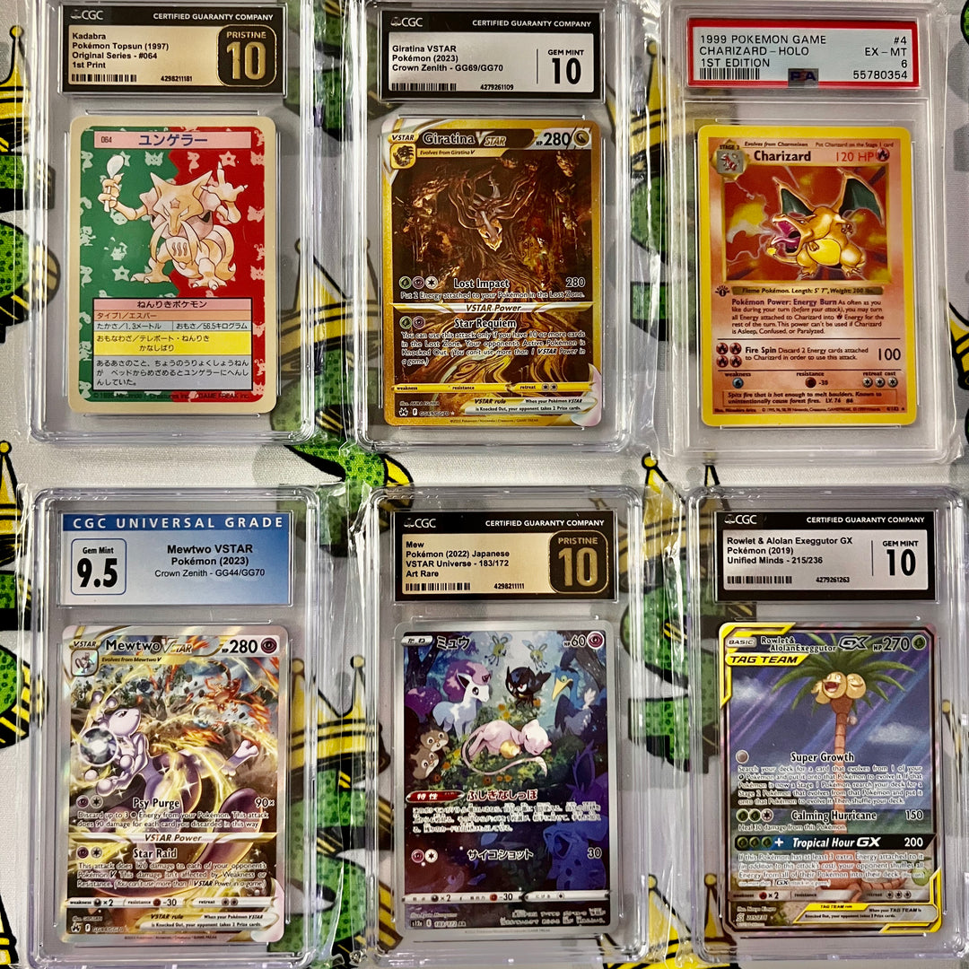 A row of graded card slabs